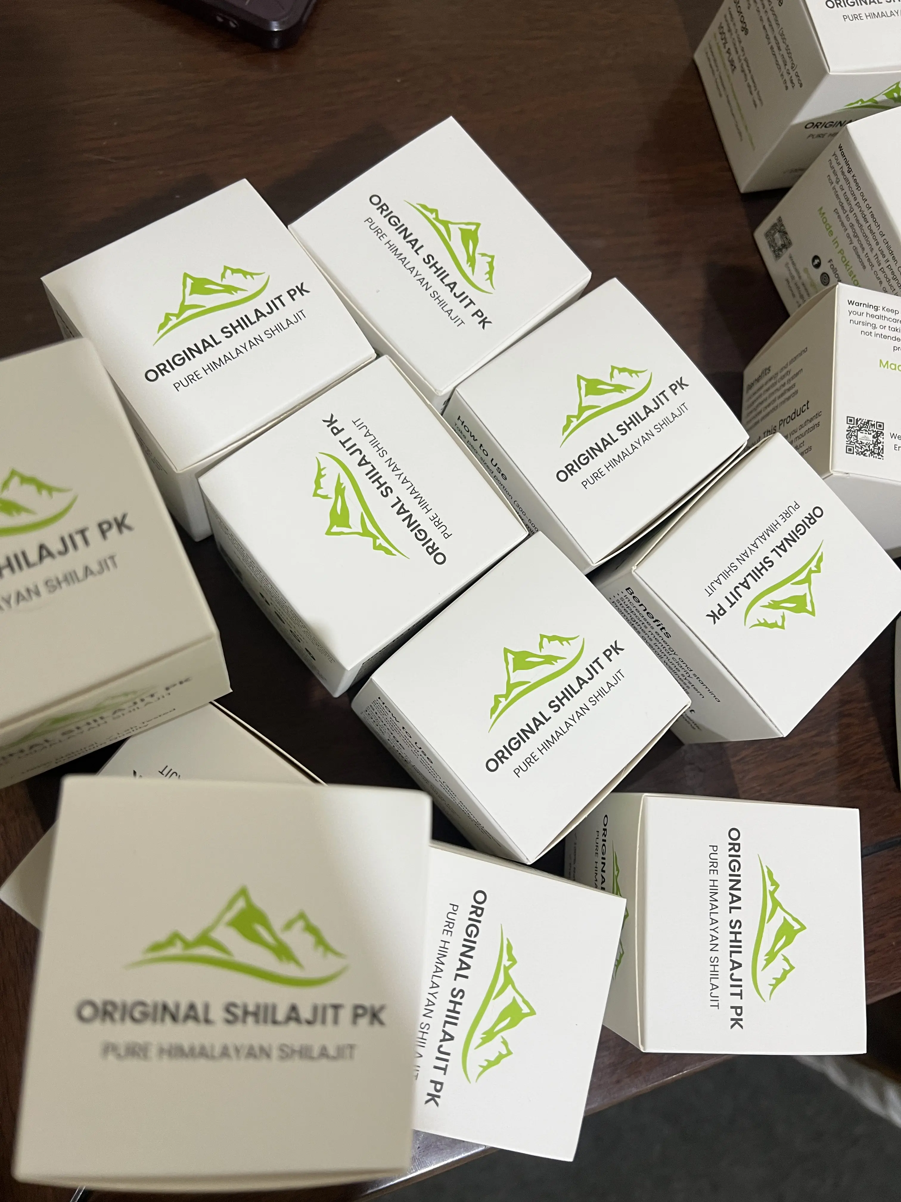 Close-up of Original Shilajit PK boxes printed with Pure Himalayan Shilajit